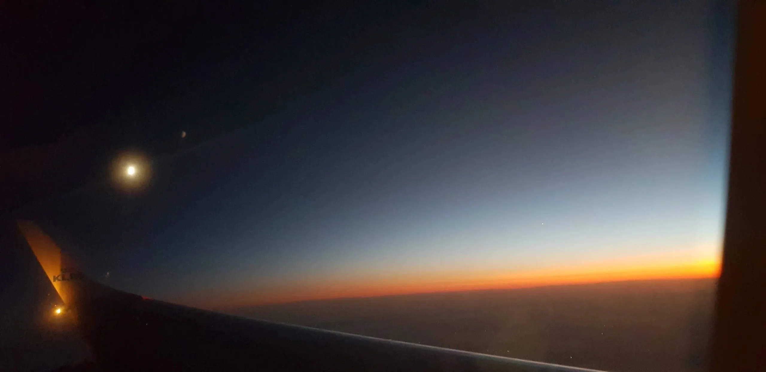 Sunset seen from an aeroplane window